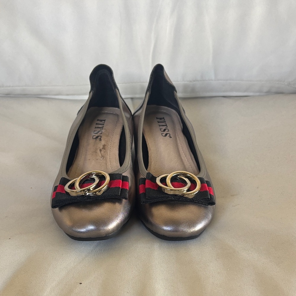 Elegant Bronze Flats with Red and Black Accents
